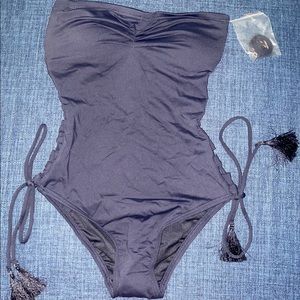 Micheal Kors One Piece cut out Navy Blue suit.